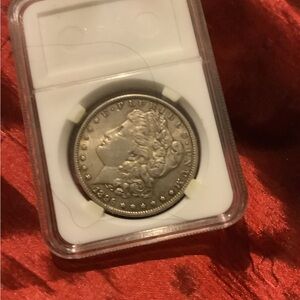 1886 Morgan Silver Dollar in Protective Holder - Silver